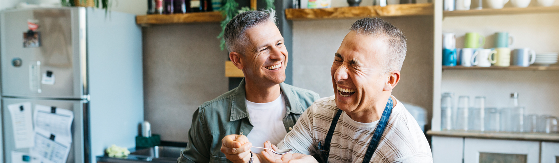 Two men cooking